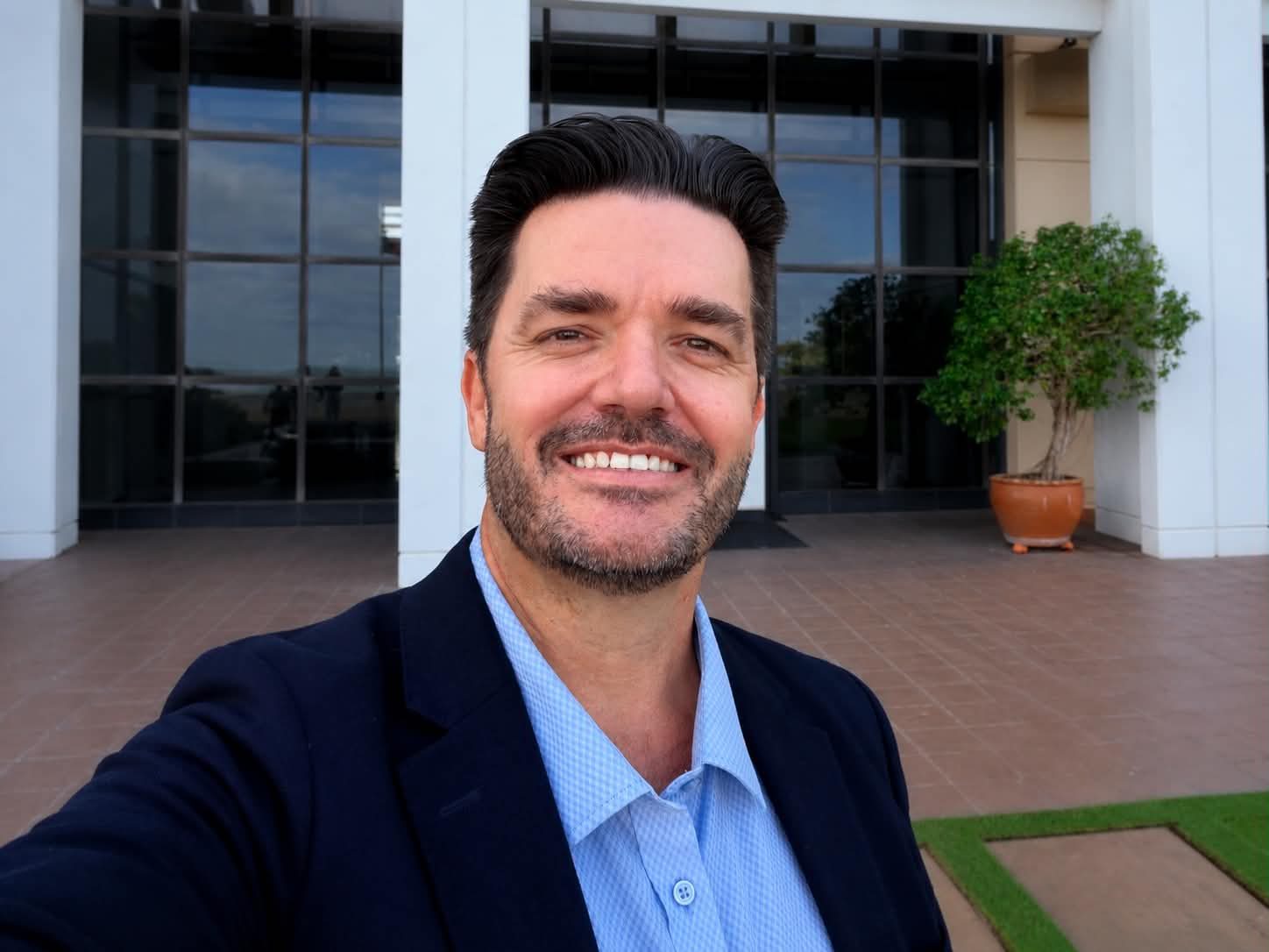 Mark Barnes outside a corporate building in Darwin, Northern Territory